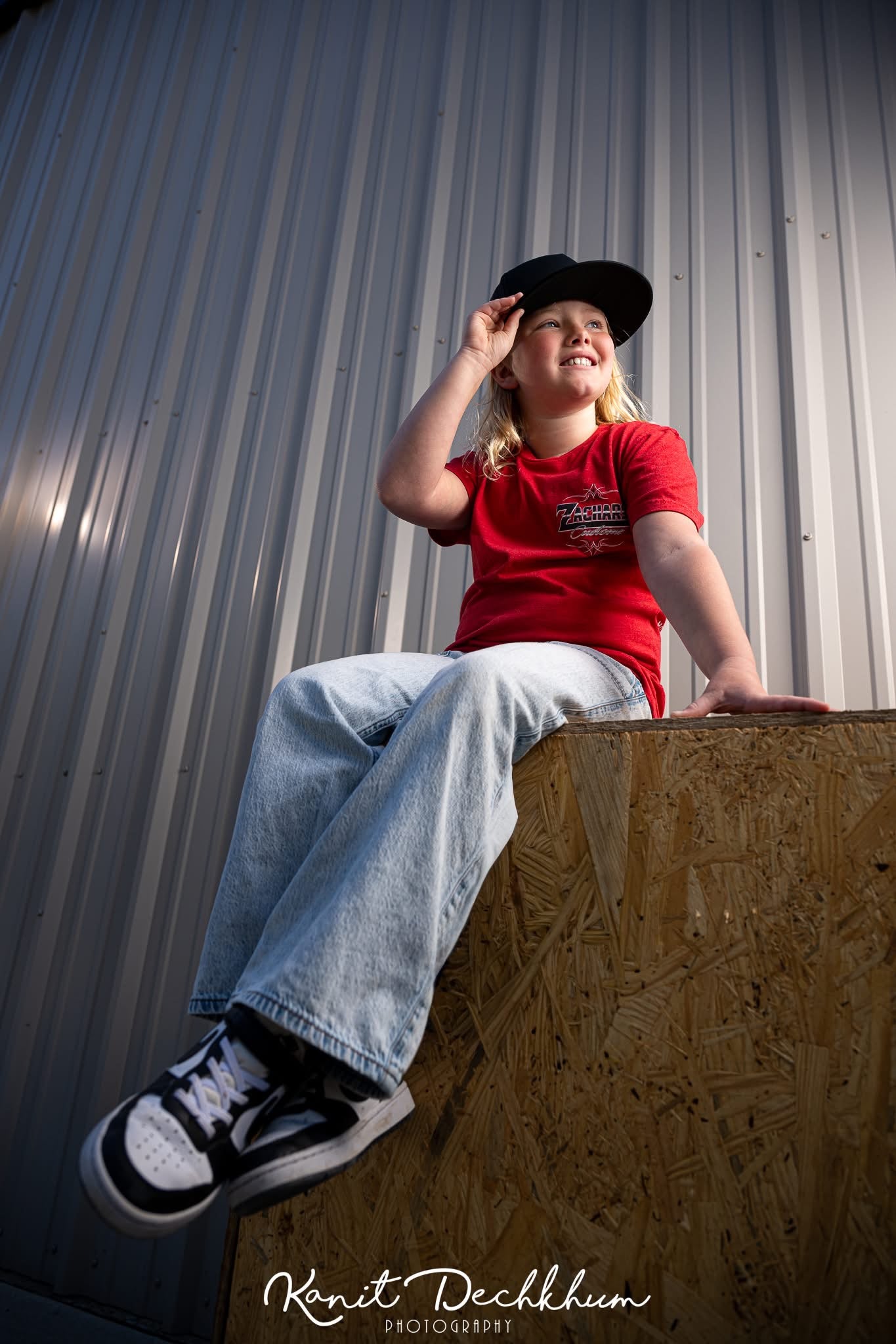 Ladies’ red shirt with black logo