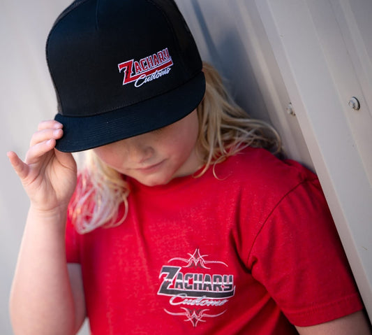 Ladies’ red shirt with black logo